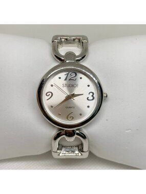 Studio silver tone women watch cuff bracelet 30mm quartz analog 6.5” running